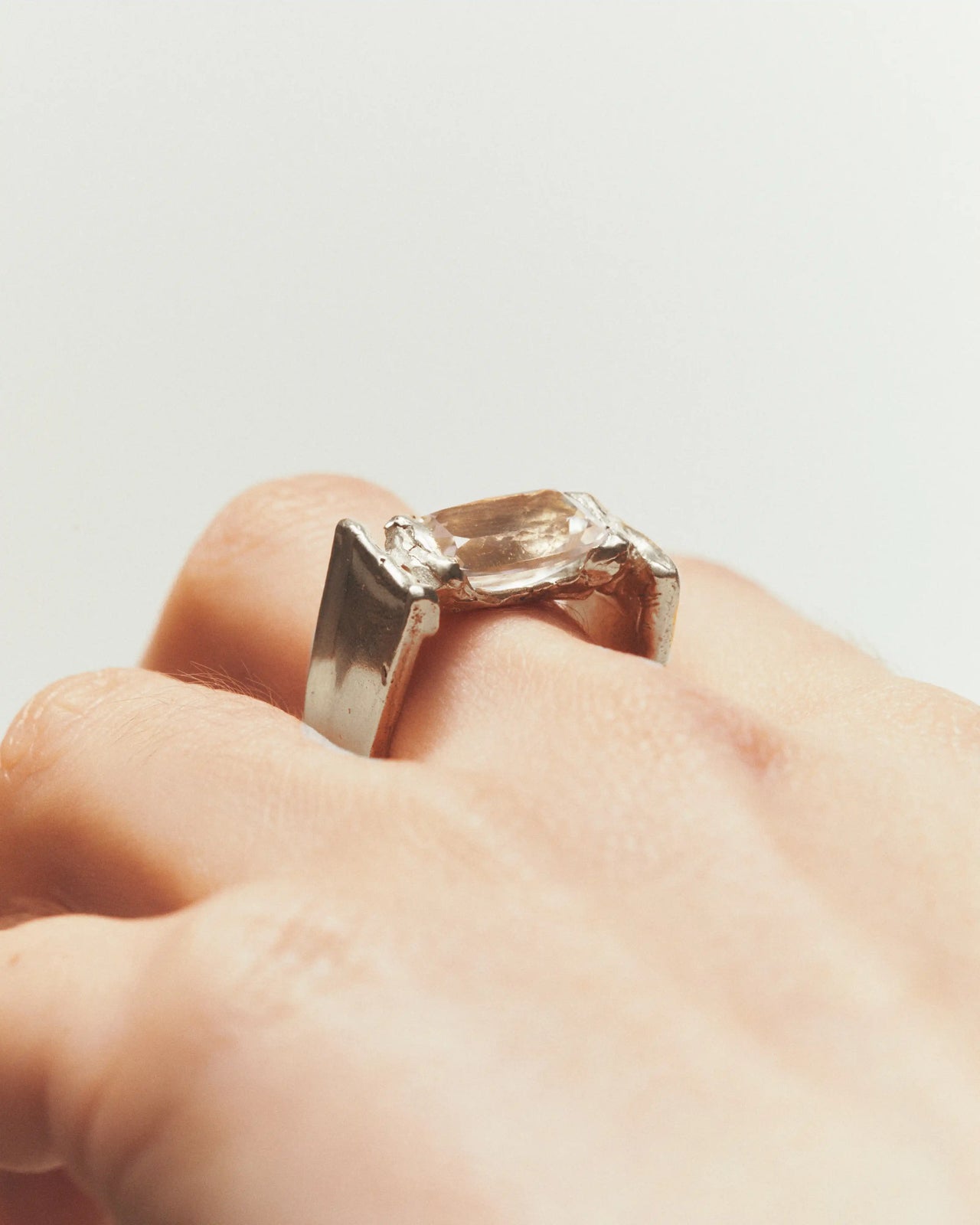 04 april white topaz ring silver hands 1