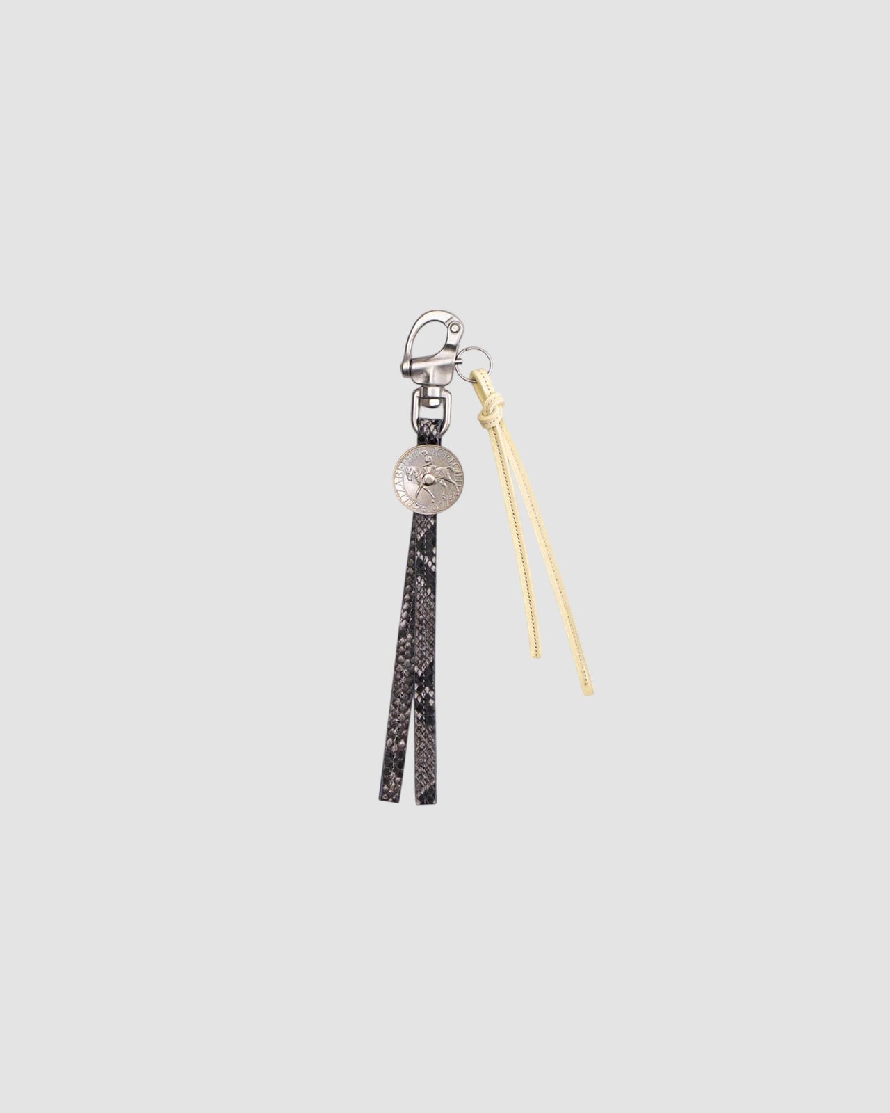 souvenir keyring   six 95   grey snake print butter 1