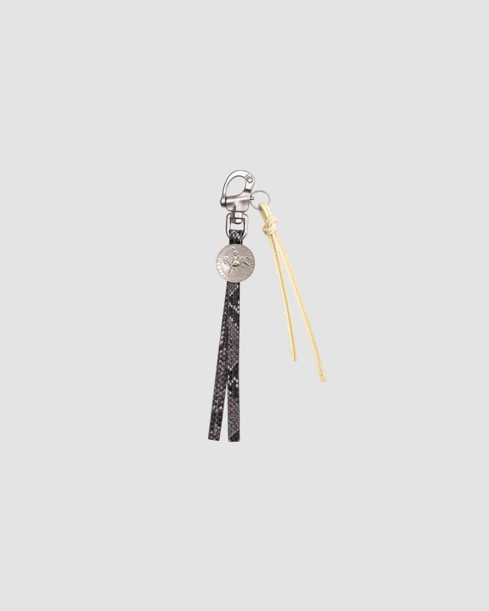 souvenir keyring   six 95   grey snake print butter 1